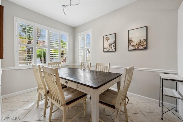 2370 Magnolia Ave Unit 6807, Naples, FL 34112 - dining space with light tile patterned flooring and plenty of natural light