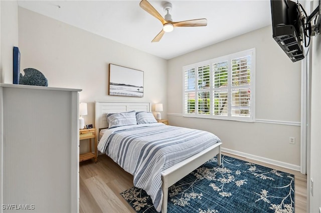 2370 Magnolia Ave Unit 6807, Naples, FL 34112 - bedroom with wood finished floors and ceiling fan