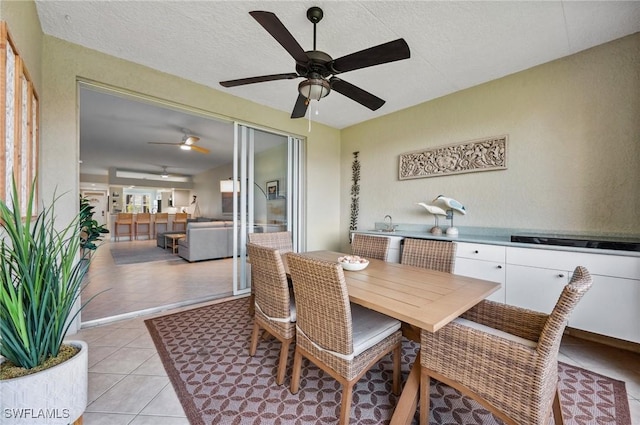 2370 Magnolia Ave Unit 6807, Naples, FL 34112 - dining space featuring ceiling fan and light tile patterned flooring