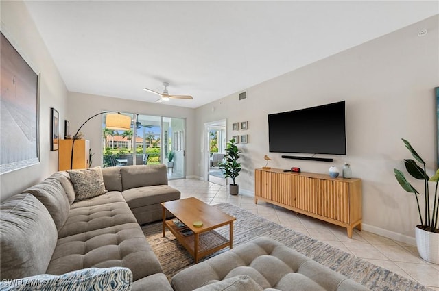 2370 Magnolia Ave Unit 6807, Naples, FL 34112 - living room featuring light tile patterned floors and ceiling fan