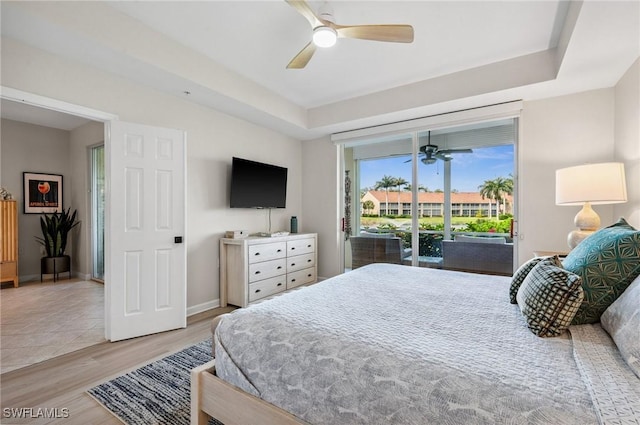 2370 Magnolia Ave Unit 6807, Naples, FL 34112 - bedroom featuring access to exterior, light wood-style floors, and a ceiling fan