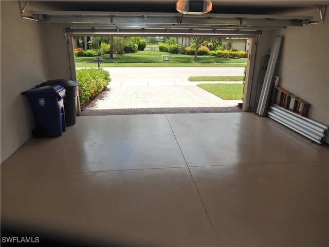 11775 Avingston Ter, Fort Myers, FL 33913 - garage featuring a garage door opener