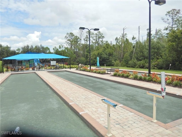 11775 Avingston Ter, Fort Myers, FL 33913 - view of property's community with a bocce ball area and view of wooded area