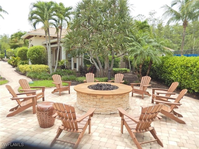 11775 Avingston Ter, Fort Myers, FL 33913 - view of patio / terrace with a fire pit