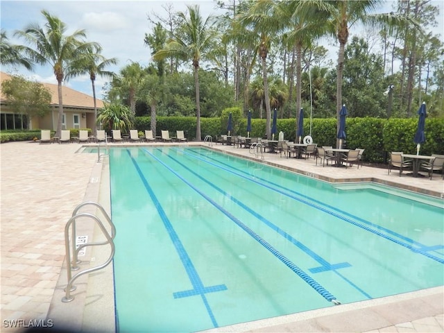 11775 Avingston Ter, Fort Myers, FL 33913 - community pool with a patio area