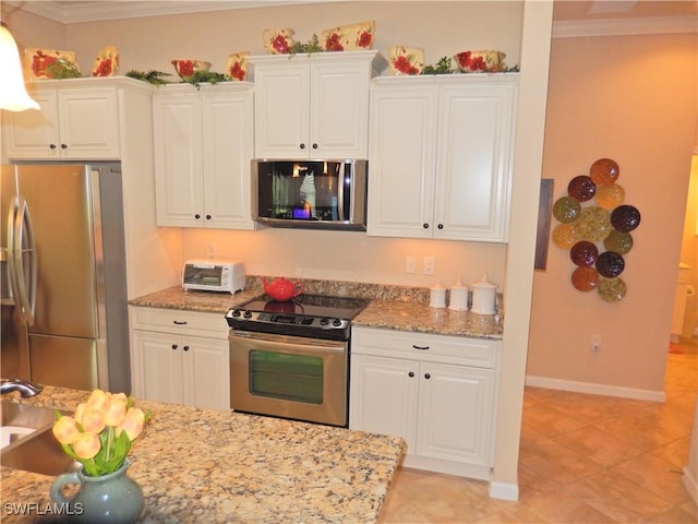 11775 Avingston Ter, Fort Myers, FL 33913 - kitchen with appliances with stainless steel finishes, crown molding, white cabinetry, light stone countertops, and light tile patterned flooring