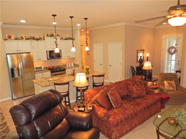 11775 Avingston Ter, Fort Myers, FL 33913 - living area with a ceiling fan, crown molding, and recessed lighting