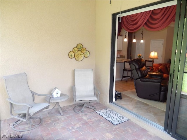 11775 Avingston Ter, Fort Myers, FL 33913 - view of exterior entry featuring stucco siding
