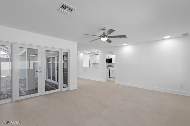 465 Donora Blvd, Fort Myers Beach, FL 33931 - unfurnished living room featuring ceiling fan and recessed lighting