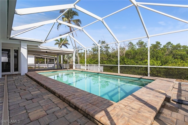 465 Donora Blvd, Fort Myers Beach, FL 33931 - outdoor pool with a patio and glass enclosure