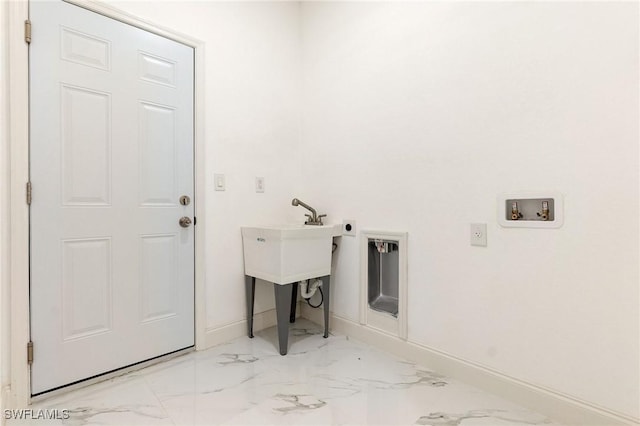 2803 E 13th St, Lehigh Acres, FL 33972 - laundry area with marble finish flooring and hookup for a washing machine