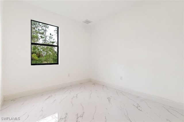 2803 E 13th St, Lehigh Acres, FL 33972 - unfurnished room with marble finish flooring