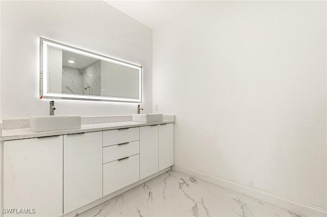 2803 E 13th St, Lehigh Acres, FL 33972 - full bathroom featuring marble look tiles, double vanity, and a marble finish shower