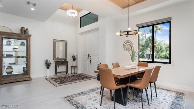 1030 22nd Ave NE, Naples, FL 34120 - dining room featuring a chandelier and recessed lighting