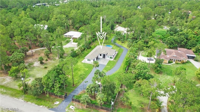 1030 22nd Ave NE, Naples, FL 34120 - view from above of property featuring a heavily wooded area