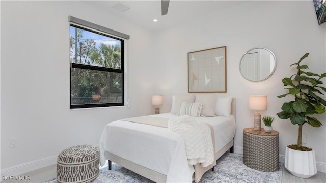 1030 22nd Ave NE, Naples, FL 34120 - bedroom featuring a ceiling fan and recessed lighting