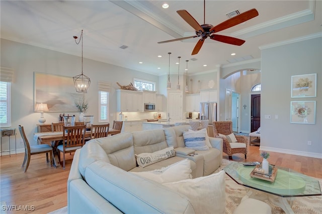 11330 Hidalgo Ct, Fort Myers, FL 33912 - living room featuring light wood-style flooring, a ceiling fan, crown molding, and recessed lighting