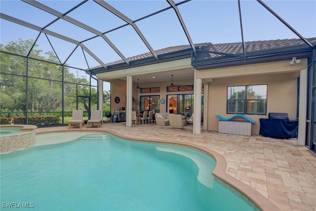 11330 Hidalgo Ct, Fort Myers, FL 33912 - view of pool featuring an outdoor hangout area, a patio, ceiling fan, and glass enclosure