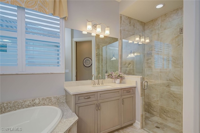 11330 Hidalgo Ct, Fort Myers, FL 33912 - bathroom featuring a stall shower, vanity, and a bath