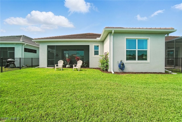 3387 Pilot Cir, Naples, FL 34120 - back of house with a sunroom, stucco siding, and a tiled roof