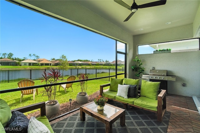 3387 Pilot Cir, Naples, FL 34120 - sunroom / solarium with a water view, a ceiling fan, and an outdoor living space