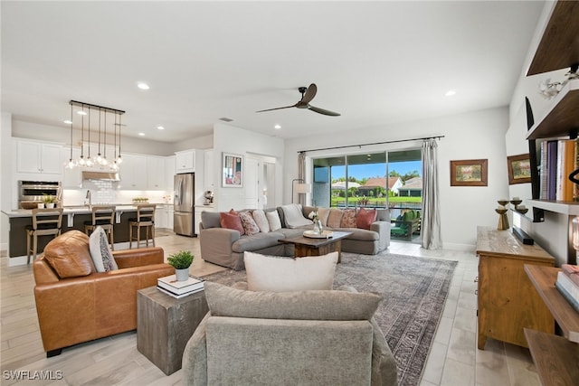 3387 Pilot Cir, Naples, FL 34120 - living room with ceiling fan and recessed lighting