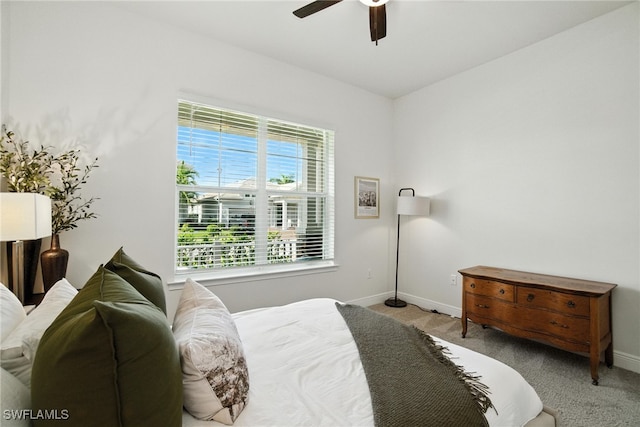 3387 Pilot Cir, Naples, FL 34120 - carpeted bedroom featuring baseboards and ceiling fan