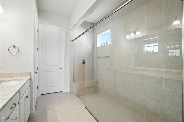 3387 Pilot Cir, Naples, FL 34120 - full bath with a walk in shower, vanity, and tile patterned flooring