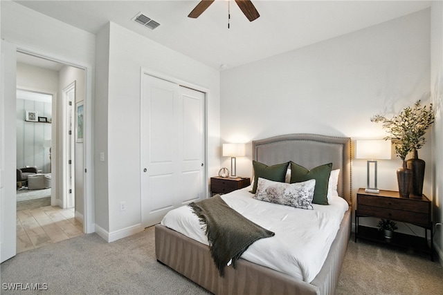 3387 Pilot Cir, Naples, FL 34120 - bedroom with carpet, a closet, and a ceiling fan