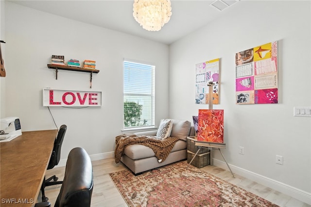 3387 Pilot Cir, Naples, FL 34120 - home office with wood finished floors and a chandelier