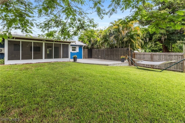 4811 Shady River Ln, Fort Myers, FL 33905 - fenced backyard with a sunroom and a patio area