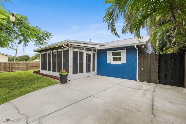 4811 Shady River Ln, Fort Myers, FL 33905 - back of house featuring a sunroom and a patio