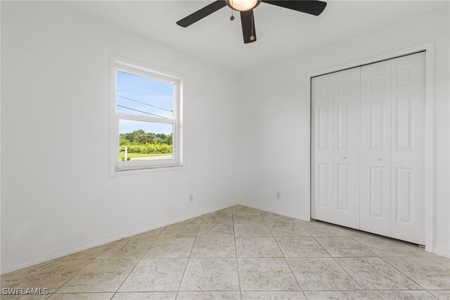 4811 Shady River Ln, Fort Myers, FL 33905 - unfurnished bedroom with a closet and a ceiling fan