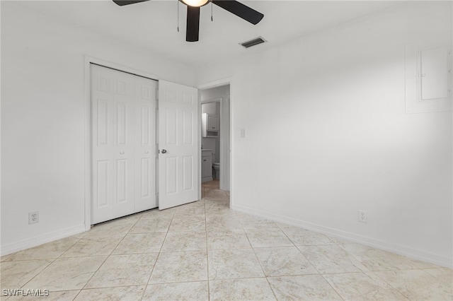 4811 Shady River Ln, Fort Myers, FL 33905 - unfurnished bedroom with a closet, ceiling fan, and light tile patterned floors