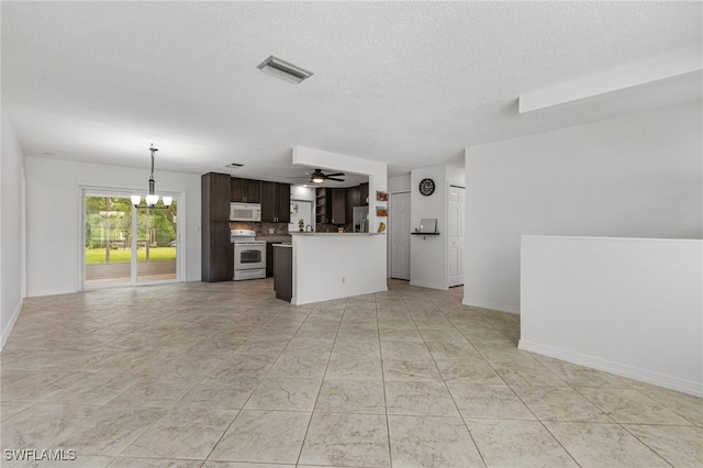 4811 Shady River Ln, Fort Myers, FL 33905 - unfurnished living room featuring a chandelier, a textured ceiling, and ceiling fan