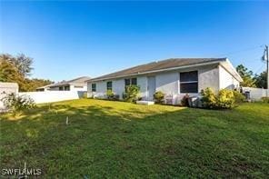 1843 Landale Loop, Lehigh Acres, FL 33972 - rear view of house