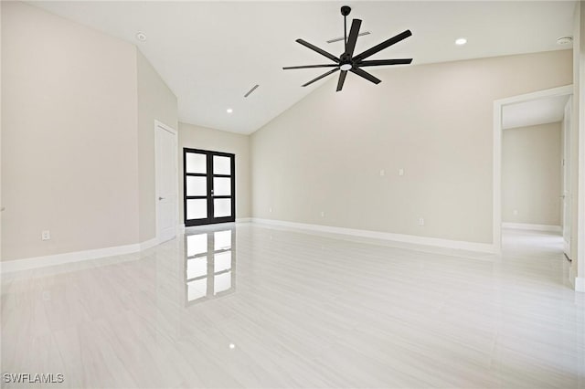 1117 SW Trafalgar Pkwy, Cape Coral, FL 33991 - spare room with french doors, ceiling fan, lofted ceiling, and recessed lighting