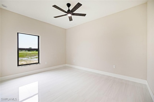 1117 SW Trafalgar Pkwy, Cape Coral, FL 33991 - spare room with a smoke detector and ceiling fan