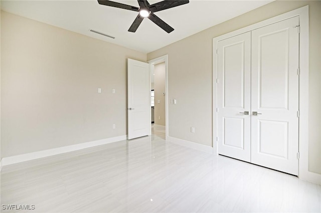 1117 SW Trafalgar Pkwy, Cape Coral, FL 33991 - unfurnished bedroom featuring a closet and ceiling fan