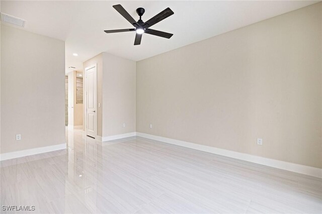 1117 SW Trafalgar Pkwy, Cape Coral, FL 33991 - empty room with ceiling fan and recessed lighting