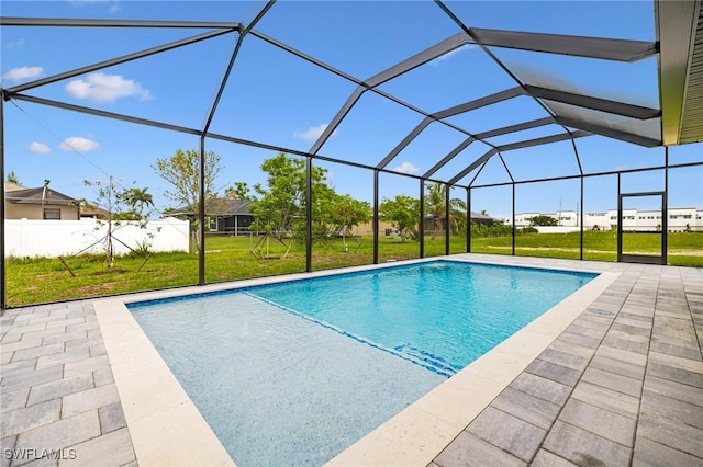 1117 SW Trafalgar Pkwy, Cape Coral, FL 33991 - outdoor pool with a lawn, a patio, and a lanai