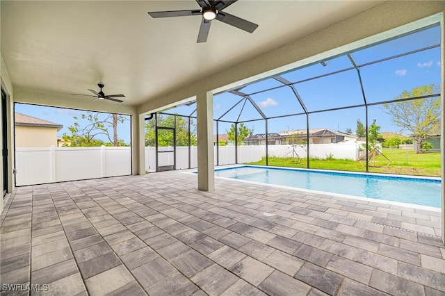 1117 SW Trafalgar Pkwy, Cape Coral, FL 33991 - view of swimming pool featuring a ceiling fan, a patio area, and a lanai