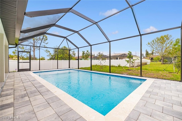 1117 SW Trafalgar Pkwy, Cape Coral, FL 33991 - view of pool featuring a yard, a patio area, and glass enclosure