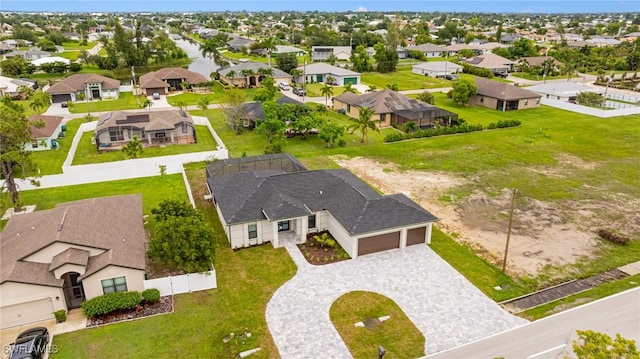 1117 SW Trafalgar Pkwy, Cape Coral, FL 33991 - aerial perspective of suburban area