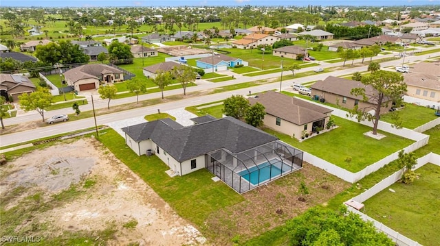 1117 SW Trafalgar Pkwy, Cape Coral, FL 33991 - aerial view of residential area with a pool area
