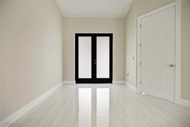 1328 SW 22nd Pl, Cape Coral, FL 33991 - empty room with baseboards and light tile patterned floors
