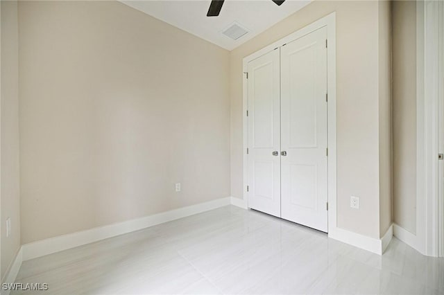 1328 SW 22nd Pl, Cape Coral, FL 33991 - unfurnished bedroom with a closet and a ceiling fan