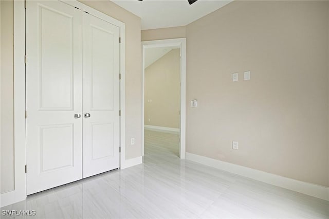 1328 SW 22nd Pl, Cape Coral, FL 33991 - unfurnished bedroom with a closet and ceiling fan