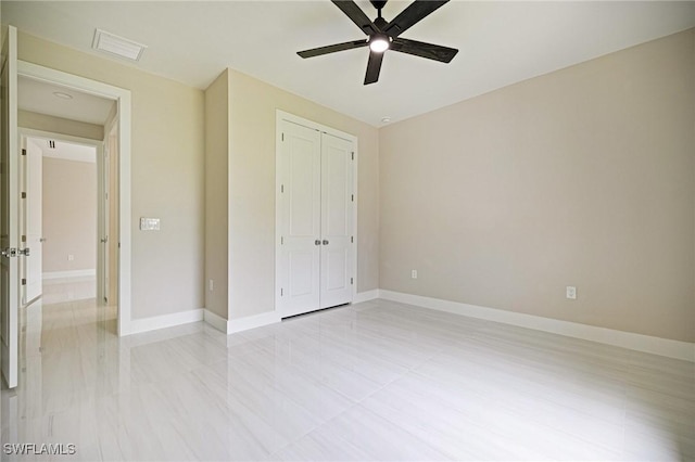1328 SW 22nd Pl, Cape Coral, FL 33991 - unfurnished bedroom with a closet and a ceiling fan