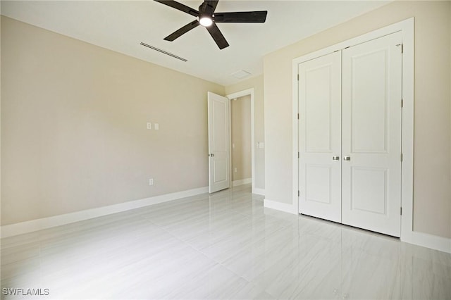 1328 SW 22nd Pl, Cape Coral, FL 33991 - unfurnished bedroom featuring a closet and a ceiling fan